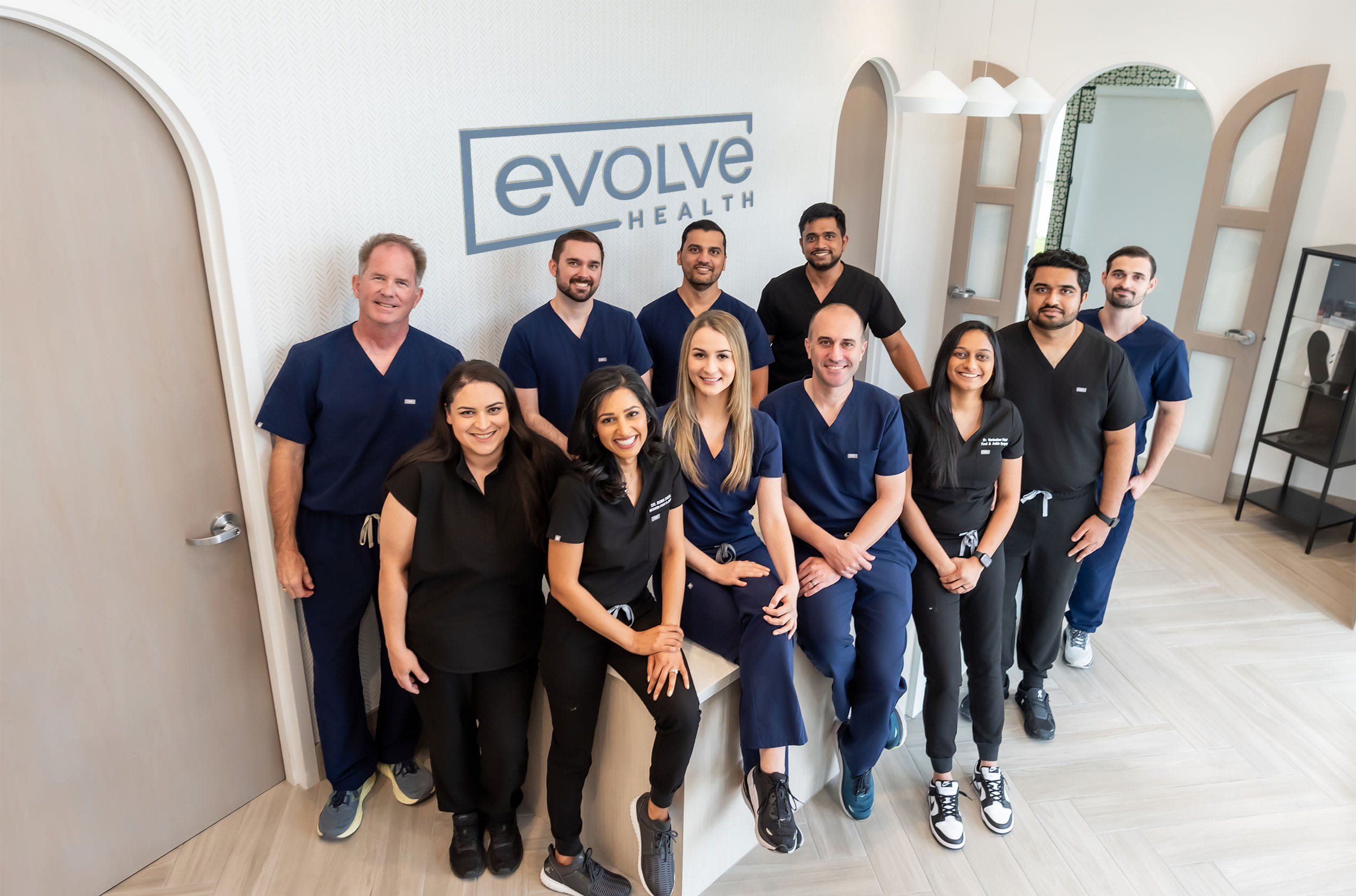 The Evolve Health physician team standing together in a clinic.